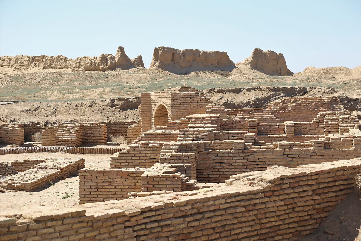 Restored gate and mud-brick walls of the lost city of Sauran
