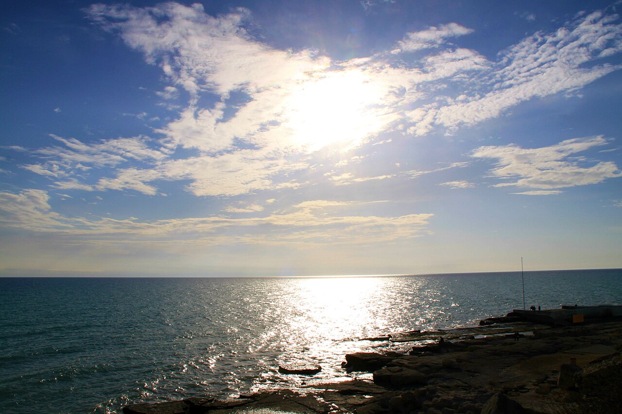 Afternoon light on the rocky limestone shoreline of the Caspian Sea at Aktau