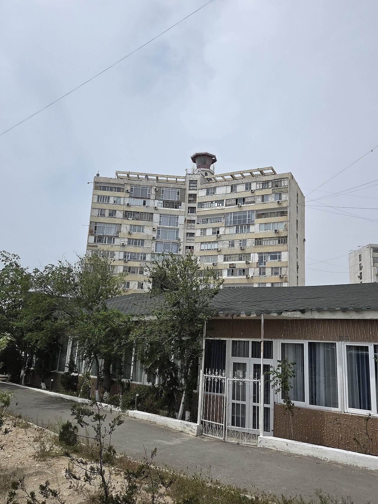 The Melovoy lighthouse on the roof of an eleven-storey apartment block in Aktau's 4th microdistrict