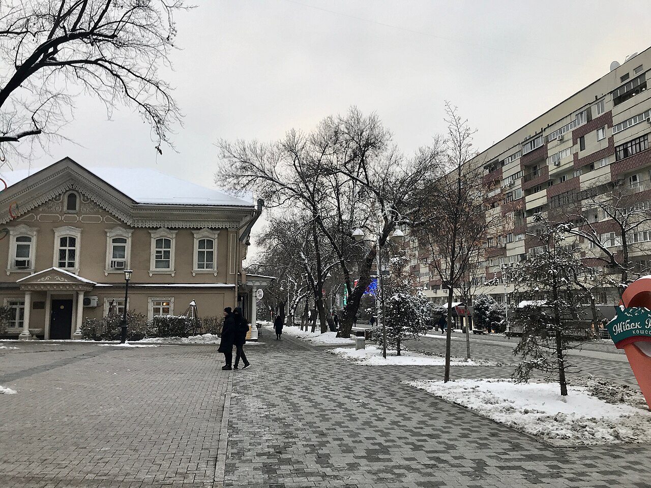 Zhibek Zholy pedestrian street in central Almaty on a quiet winter afternoon