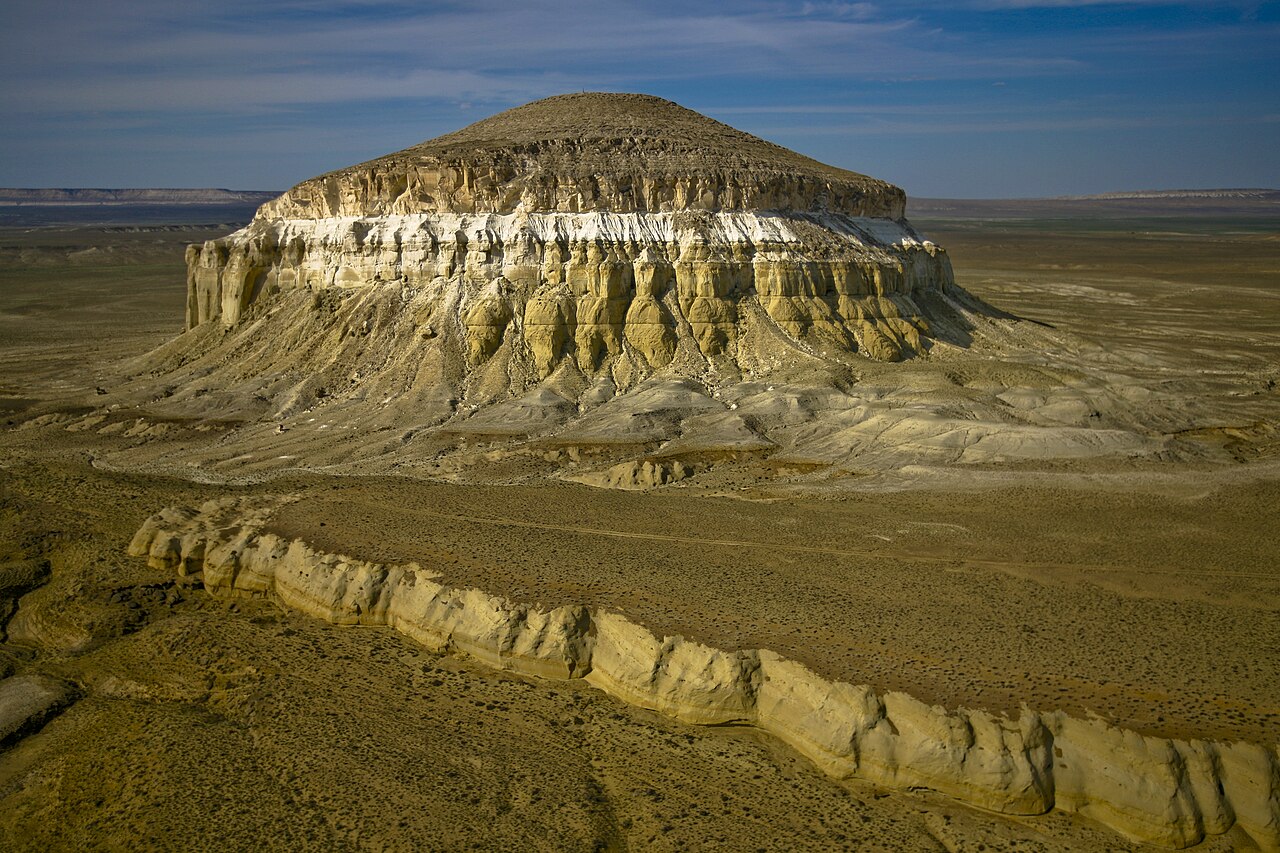 Sherkala from above, the yurt-shaped chalk-banded dome rising from the Mangystau steppe near Shetpe