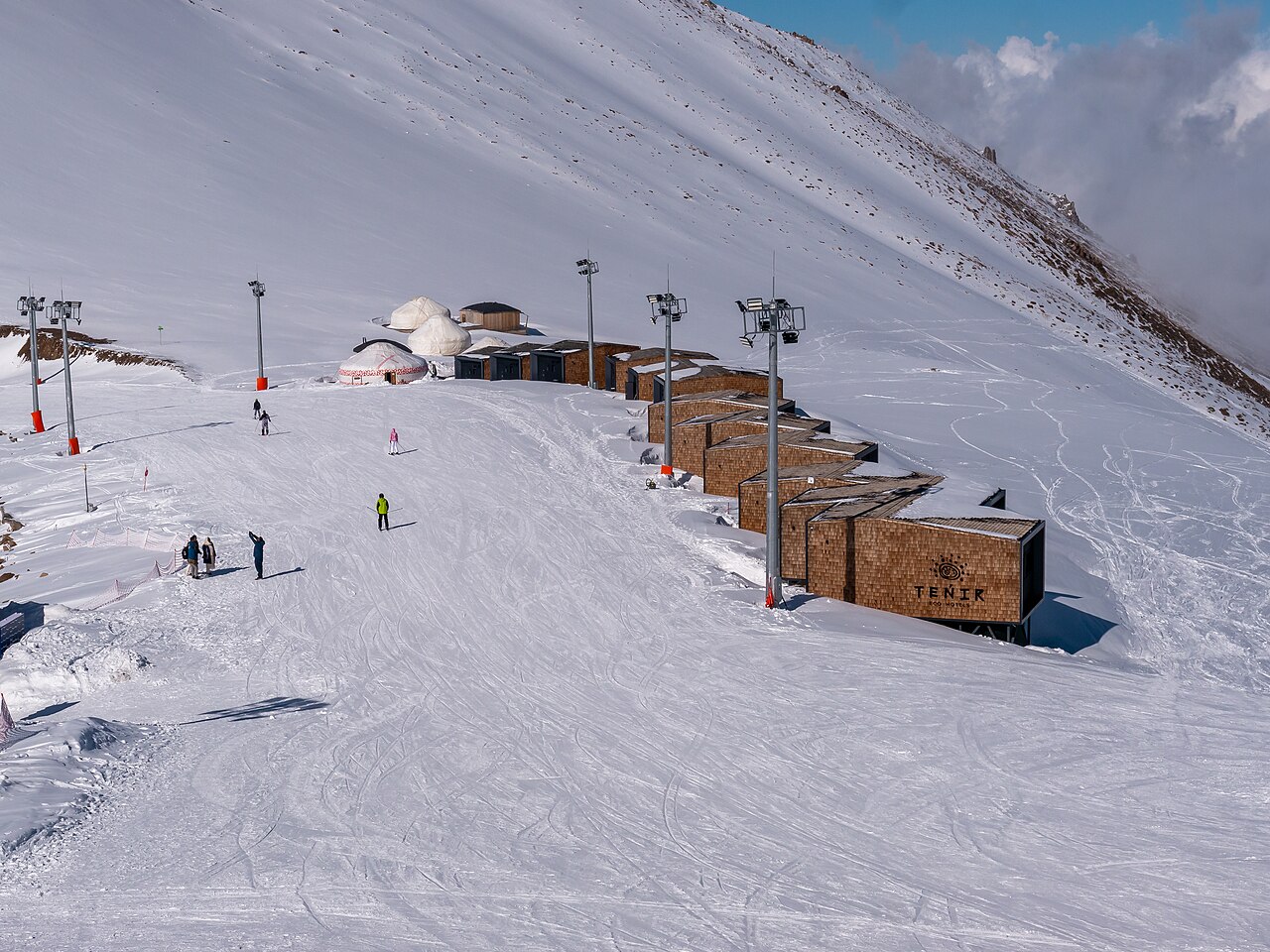 Wooden eco-lodges on the piste at Shymbulak above Almaty, a scenic mountain alternative to a city hotel